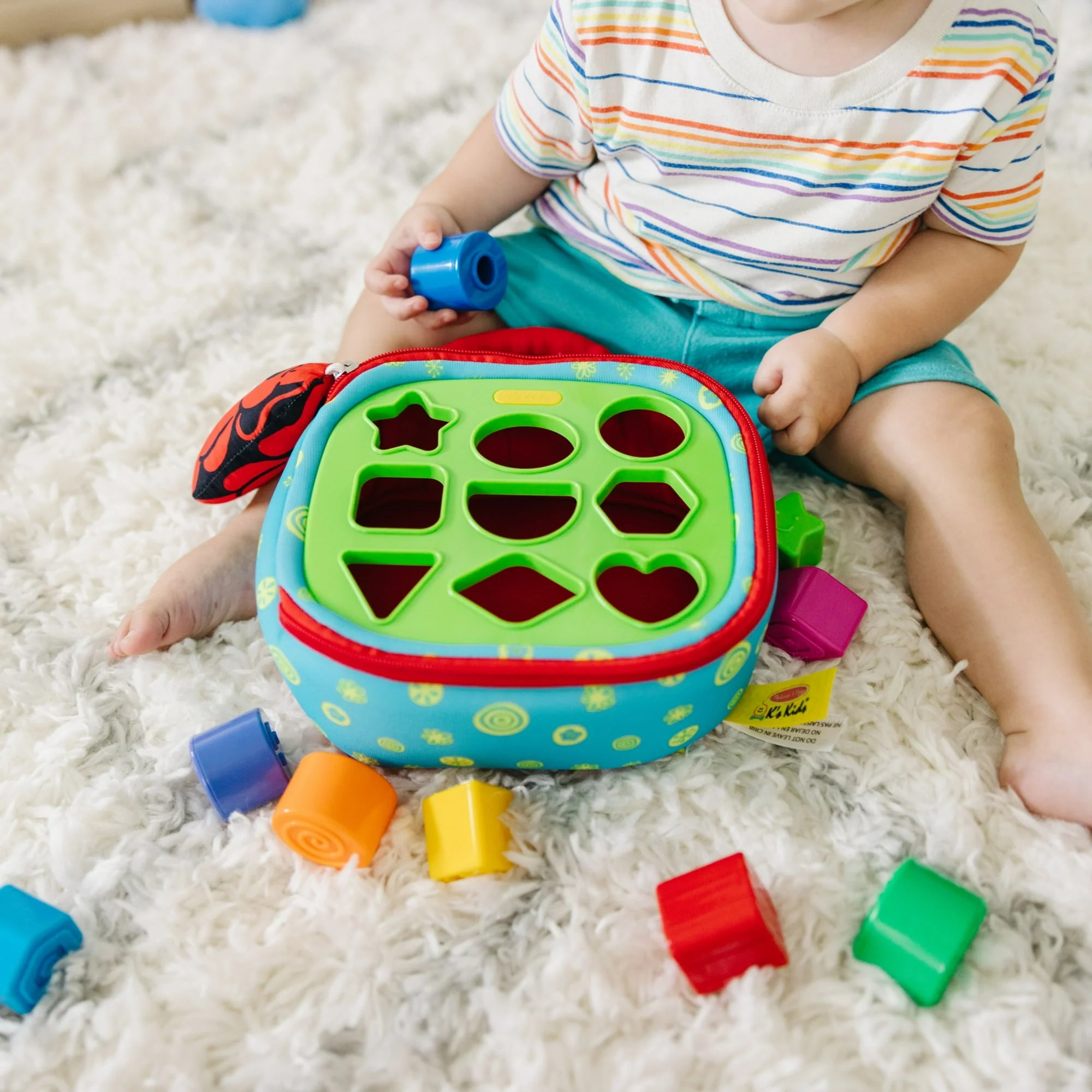 Melissa & Doug K's Kids Take-Along Shape Sorter Baby Toy With 2-Sided Activity Bag and 9 Textured Shape Blocks - Image 6